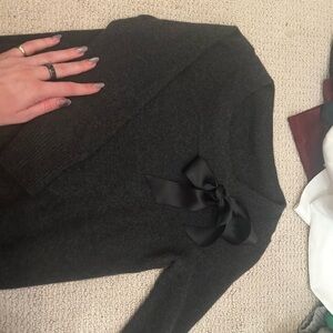 Elegant Black Sweater with Bow Detail